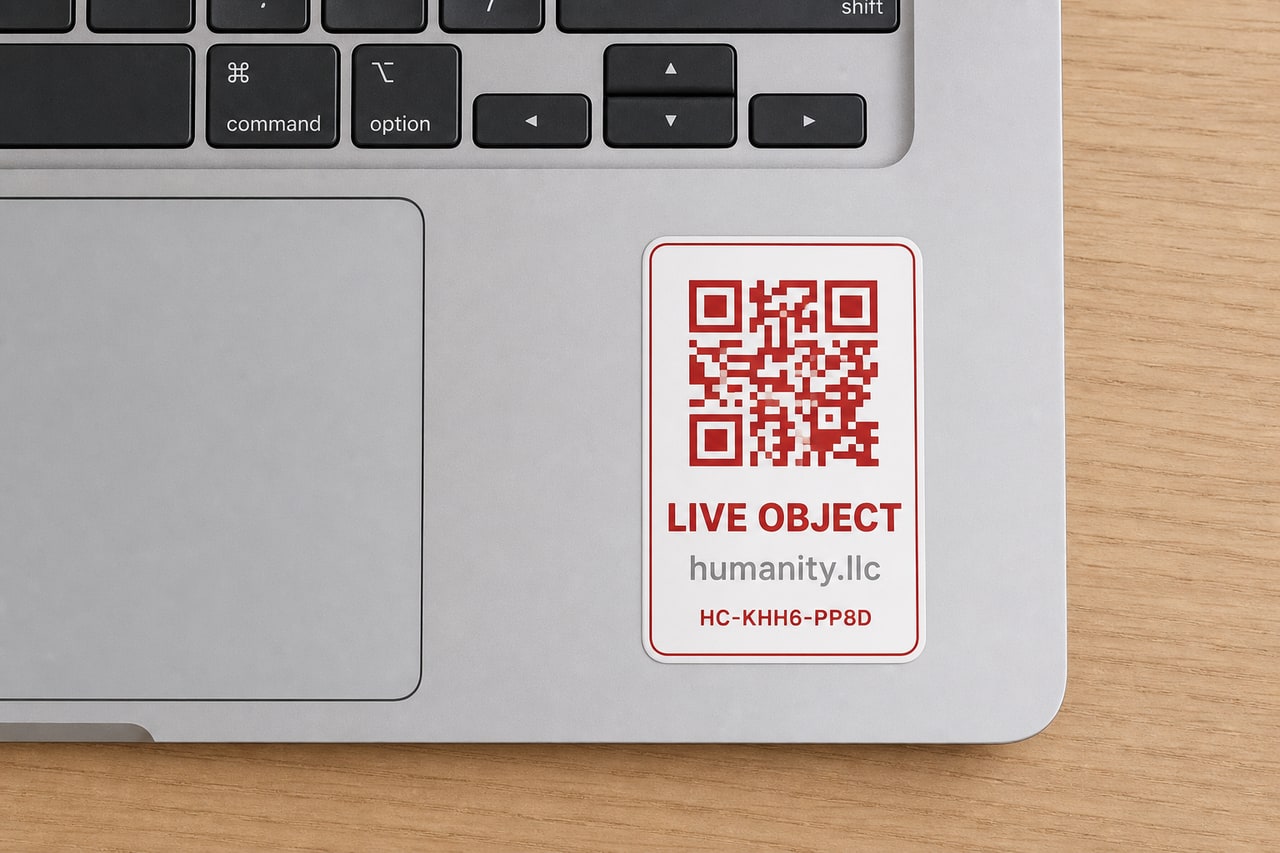 Founding signal sticker on laptop palm rest beside trackpad